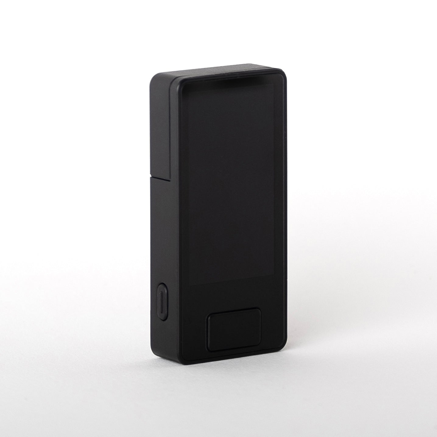 Angled front view of Blockstream Jade Plus Bitcoin hardware wallet in matte-black finish, showing display, navigation button, and side power button