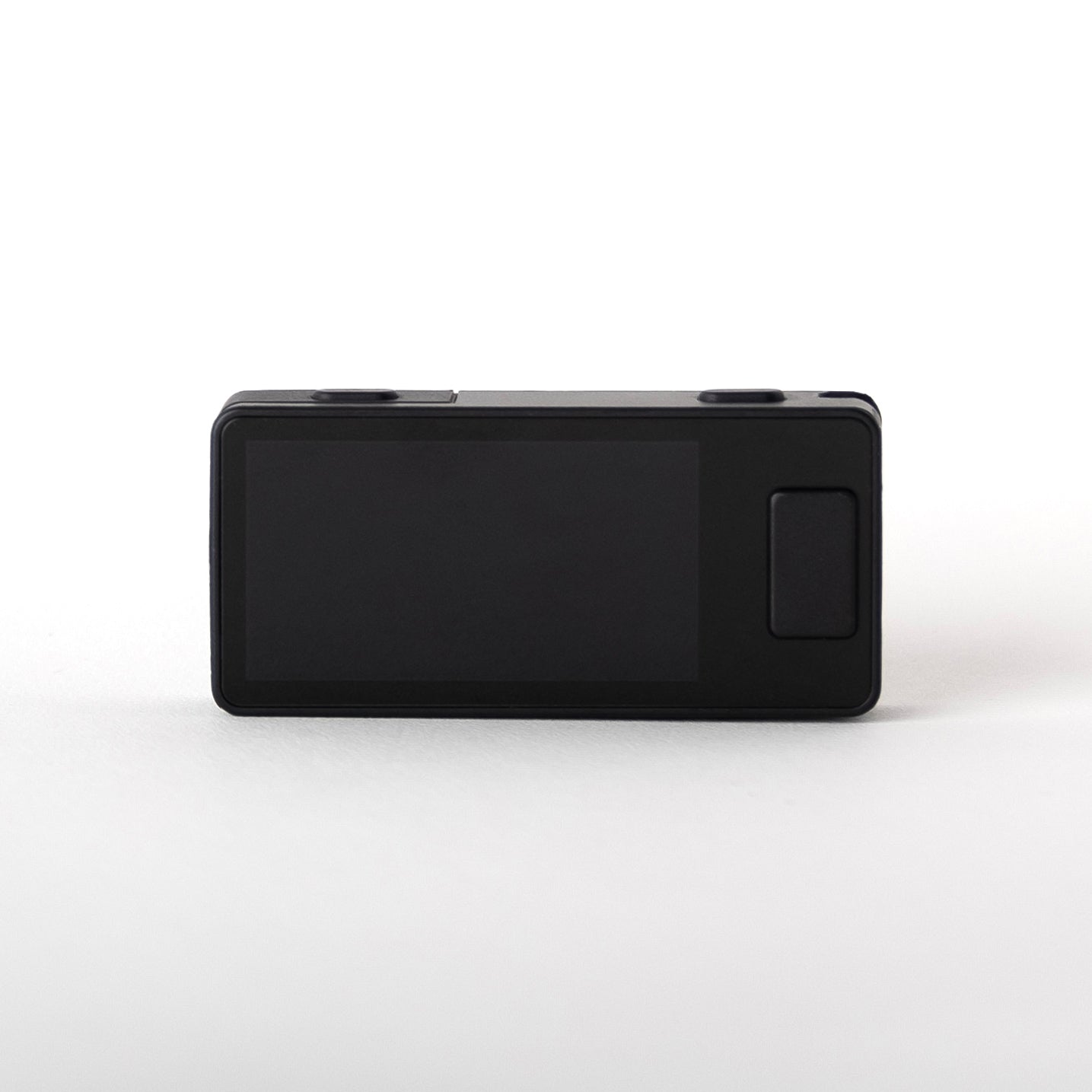 Landscape orientation of Blockstream Jade Plus Bitcoin hardware wallet in matte-black finish, showing widescreen display and right-side navigation button