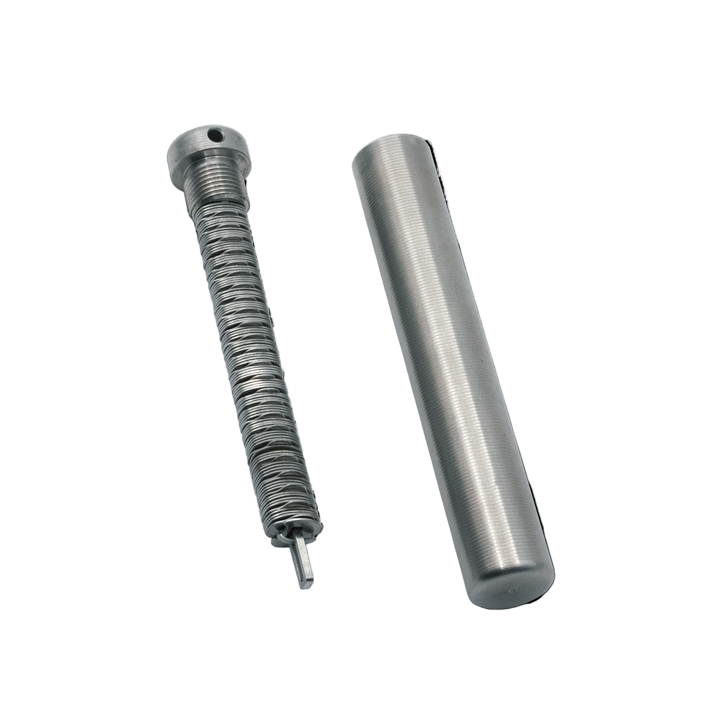 A stainless steel capsule backup tool with its lid open, showing the storage area for seed words.