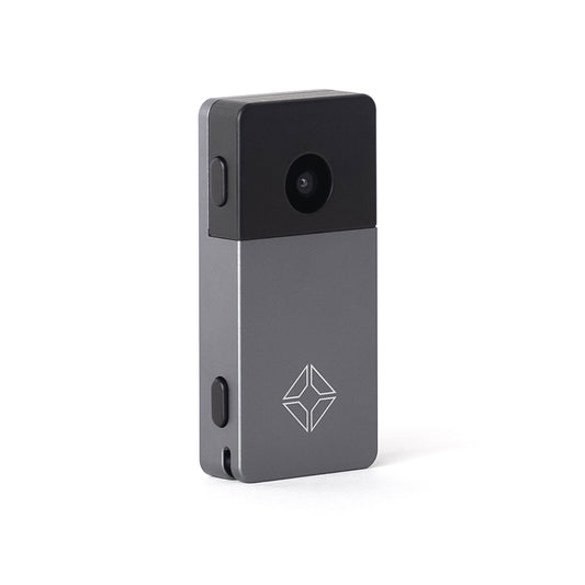 Backside view of Blockstream Jade Plus Bitcoin hardware wallet featuring QR-signing camera, gray aluminum body, and engraved logo