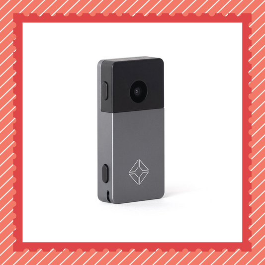 Backside view of Blockstream Jade Plus Bitcoin hardware wallet featuring QR-signing camera, gray aluminum body, and engraved logo