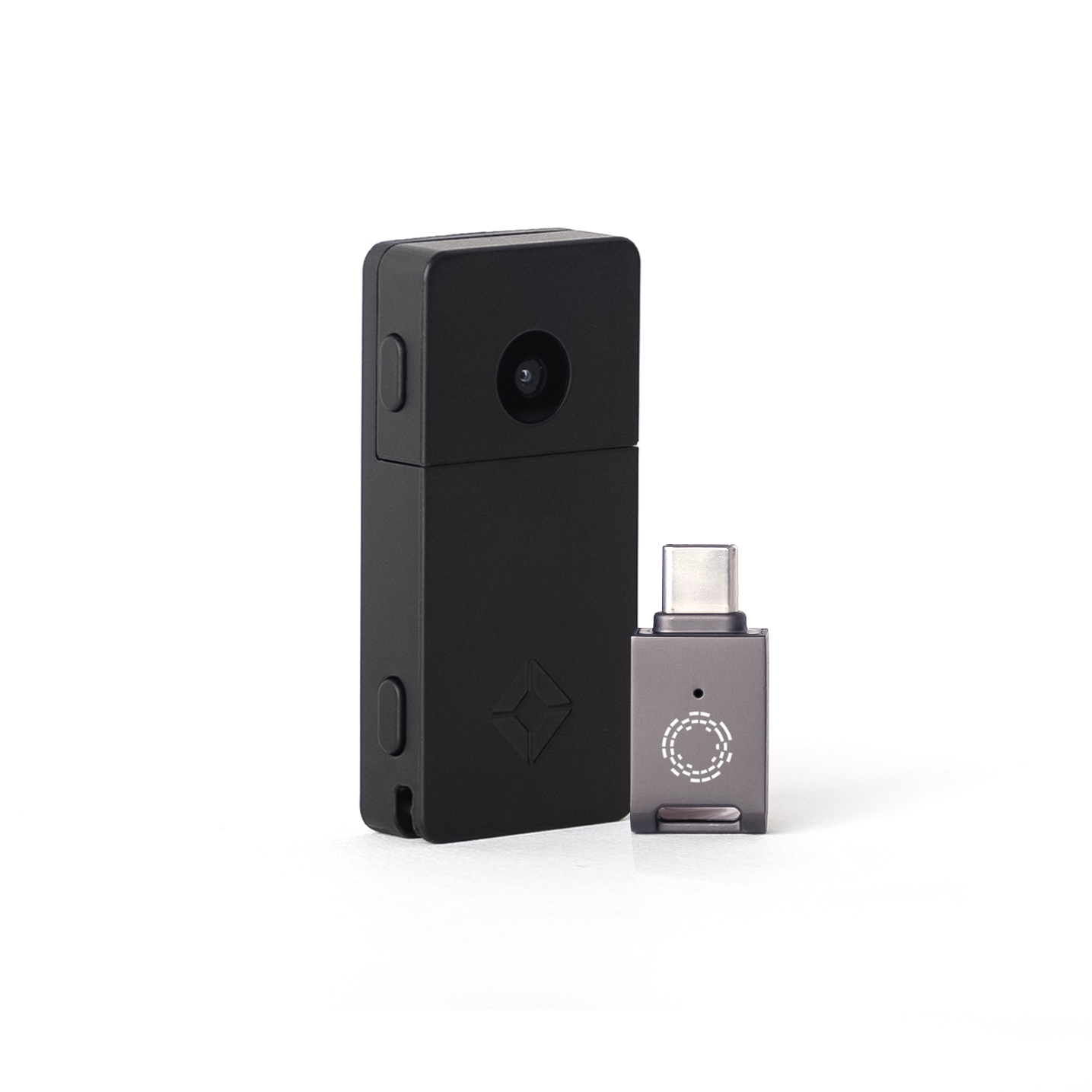 Black Blockstream Jade Plus Bitcoin hardware wallet with USB-C adapter, featuring QR-signing camera and engraved logo